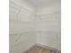 Walk-in closet with ventilated wire shelving to maximize storage at 705 Sunderland Sw Rd, Concord, NC 28027