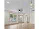 Open living area shows hardwood floors, neutral paint and trim, and lots of natural light at 705 Sunderland Sw Rd, Concord, NC 28027