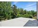 A flat roof overlooks lush trees against a blue sky at 7166 Dove Field Ln, Fort Mill, SC 29707
