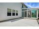 Exterior of home featuring a patio space, sunroom, and fenced in yard at 7166 Dove Field Ln, Fort Mill, SC 29707