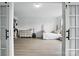 Large bedroom with bed, dresser, and guitar at 7166 Dove Field Ln, Fort Mill, SC 29707