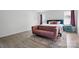 Bedroom with a statement rug and large windows providing great natural light at 7166 Dove Field Ln, Fort Mill, SC 29707