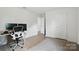 This bedroom features wood floors, bright light, and ample space at 7166 Dove Field Ln, Fort Mill, SC 29707