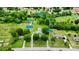 Aerial view showing the home on 2.3 acres, the detached garage and dual entrance driveway at 806 N Central Ave, Locust, NC 28097