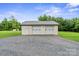 Two car detached garage with gravel driveway at 806 N Central Ave, Locust, NC 28097
