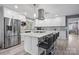Stylish kitchen featuring a large island with seating, stainless steel appliances, and plenty of cabinet space at 806 N Central Ave, Locust, NC 28097