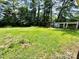 The property has a large backyard with a covered patio at 820 Kerley Ct, Statesville, NC 28677