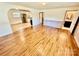 Stylish living room showcasing hardwood floors and easy access to the kitchen and bathroom at 820 Kerley Ct, Statesville, NC 28677