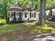 Charming one-story home with a cozy front porch and well-maintained yard at 903 W Oak St, Shelby, NC 28150