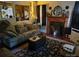 Cozy living room with a classic fireplace, comfortable seating, and stylish decor at 903 W Oak St, Shelby, NC 28150