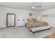 Bedroom with gray carpet, ceiling fan, and a comfortable bed at 941 Rachel Anne Dr, Belmont, NC 28012