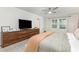 Spacious bedroom with wood dressers, natural light, and plush carpeting at 941 Rachel Anne Dr, Belmont, NC 28012