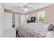 Comfortable bedroom featuring ample natural light, closet space, and a calming color scheme at 9775 Mallard Glen Dr, Charlotte, NC 28262