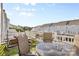 Outdoor deck with lawn, patio furniture, and neighborhood views at 9775 Mallard Glen Dr, Charlotte, NC 28262
