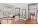 Bright living room with hardwood floors, large windows, and elegant decor at 9775 Mallard Glen Dr, Charlotte, NC 28262