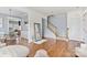 Stylish living space with hardwood floors, adjacent to dining area at 9775 Mallard Glen Dr, Charlotte, NC 28262