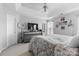 Bright and spacious main bedroom with a tray ceiling and a ceiling fan at 9775 Mallard Glen Dr, Charlotte, NC 28262