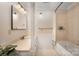 Bathroom featuring large mirror, vanity, and shower-tub combo at 1014 Covewood Ct, Charlotte, NC 28270