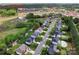 Aerial view of a residential area, including homes, streets, and nearby shopping at 1016 Spanish Moss Rd, Indian Trail, NC 28079
