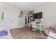 Comfortable bedroom with a large desk, modern decor, and ample closet space at 1016 Spanish Moss Rd, Indian Trail, NC 28079