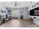 Entertainment room featuring comfortable seating, large screen and a convenient mini-fridge at 1016 Spanish Moss Rd, Indian Trail, NC 28079