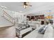Living room featuring an open floor plan and hardwood floors, offering a seamless blend of living at 1016 Spanish Moss Rd, Indian Trail, NC 28079