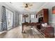 Office with built in desk and cabinets, hardwood floors and natural light at 1016 Spanish Moss Rd, Indian Trail, NC 28079