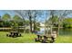 View of community pond with bench seating at 1016 Spanish Moss Rd, Indian Trail, NC 28079