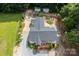 Aerial view of home featuring a well-maintained yard and gardens at 10743 Ola Dr, Fort Mill, SC 29707