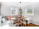 Cozy dining area features a built-in bench and a modern pendant light at 10743 Ola Dr, Fort Mill, SC 29707