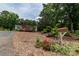 Charming home with front yard featuring colorful roses near the mailbox and a spacious lot at 10743 Ola Dr, Fort Mill, SC 29707