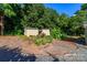 View of the gardens featuring raised garden beds with various plants and sheds at 10743 Ola Dr, Fort Mill, SC 29707