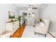 Cozy living room with hardwood floors, neutral tones, and comfortable seating creates a welcoming space at 10743 Ola Dr, Fort Mill, SC 29707