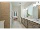 Bright bathroom with a double vanity and a bedroom view, blending comfort and design at 1133 Idyllic Ln, Waxhaw, NC 28173