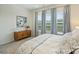 Cozy bedroom with neutral tones and large windows, creating a relaxing atmosphere at 1133 Idyllic Ln, Waxhaw, NC 28173