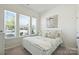Comfortable bedroom with natural light, complemented by a stylish bed and decor at 1133 Idyllic Ln, Waxhaw, NC 28173