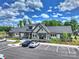 Beautiful clubhouse with a thoughtfully designed exterior and attractive landscaping at 1133 Idyllic Ln, Waxhaw, NC 28173