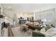 Inviting living room and open-concept kitchen with modern fixtures and finishes at 1133 Idyllic Ln, Waxhaw, NC 28173