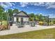 Outdoor patio area with grill and comfortable seating, perfect for gatherings and dining at 1133 Idyllic Ln, Waxhaw, NC 28173