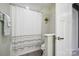 Bathroom featuring modern fixtures, stylish shower curtain, and a fresh, clean design at 117 Lanyard Dr # E, Mooresville, NC 28117