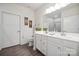 Bright bathroom features double vanity, modern fixtures, and separate toilet room at 117 Lanyard Dr # E, Mooresville, NC 28117