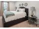 Relaxing bedroom featuring a comfortable bed, soft lighting, and a serene atmosphere at 117 Lanyard Dr # E, Mooresville, NC 28117