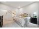 Inviting bedroom features neutral décor, plush bedding, and convenient ensuite access at 117 Lanyard Dr # E, Mooresville, NC 28117