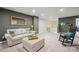 Well-lit bonus room featuring neutral tones, comfortable seating, and a cozy ambiance at 117 Lanyard Dr # E, Mooresville, NC 28117