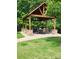 Picturesque outdoor gazebo with seating provides a perfect spot for gatherings and relaxation at 117 Lanyard Dr # E, Mooresville, NC 28117