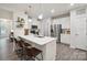 Contemporary kitchen with white cabinets, stainless steel appliances, a central island, and hardwood floors at 117 Lanyard Dr # E, Mooresville, NC 28117