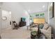 Spacious living room with ample natural light, comfortable seating, and stylish decor at 117 Lanyard Dr # E, Mooresville, NC 28117