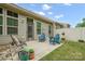 A cozy patio offers ample space for relaxing, complete with patio furniture and views of the backyard at 117 Lanyard Dr # E, Mooresville, NC 28117