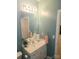 Bathroom vanity with a sink and mirror at 1253 Iverleigh Trl, Charlotte, NC 28270