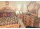 This bedroom features a large dresser with a marble top and matching mirror at 1253 Iverleigh Trl, Charlotte, NC 28270